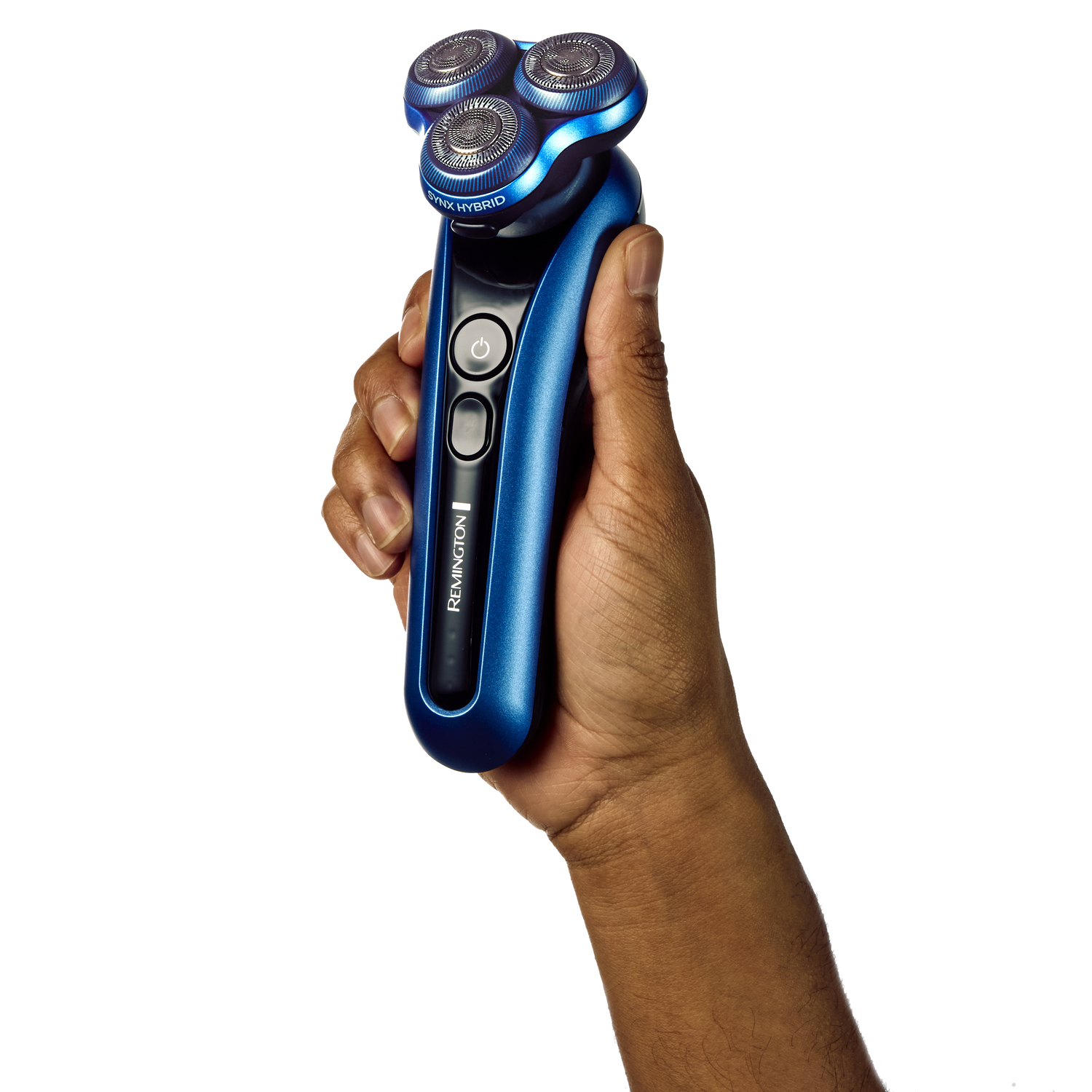 Hand holding a blue and silver electric shaver.