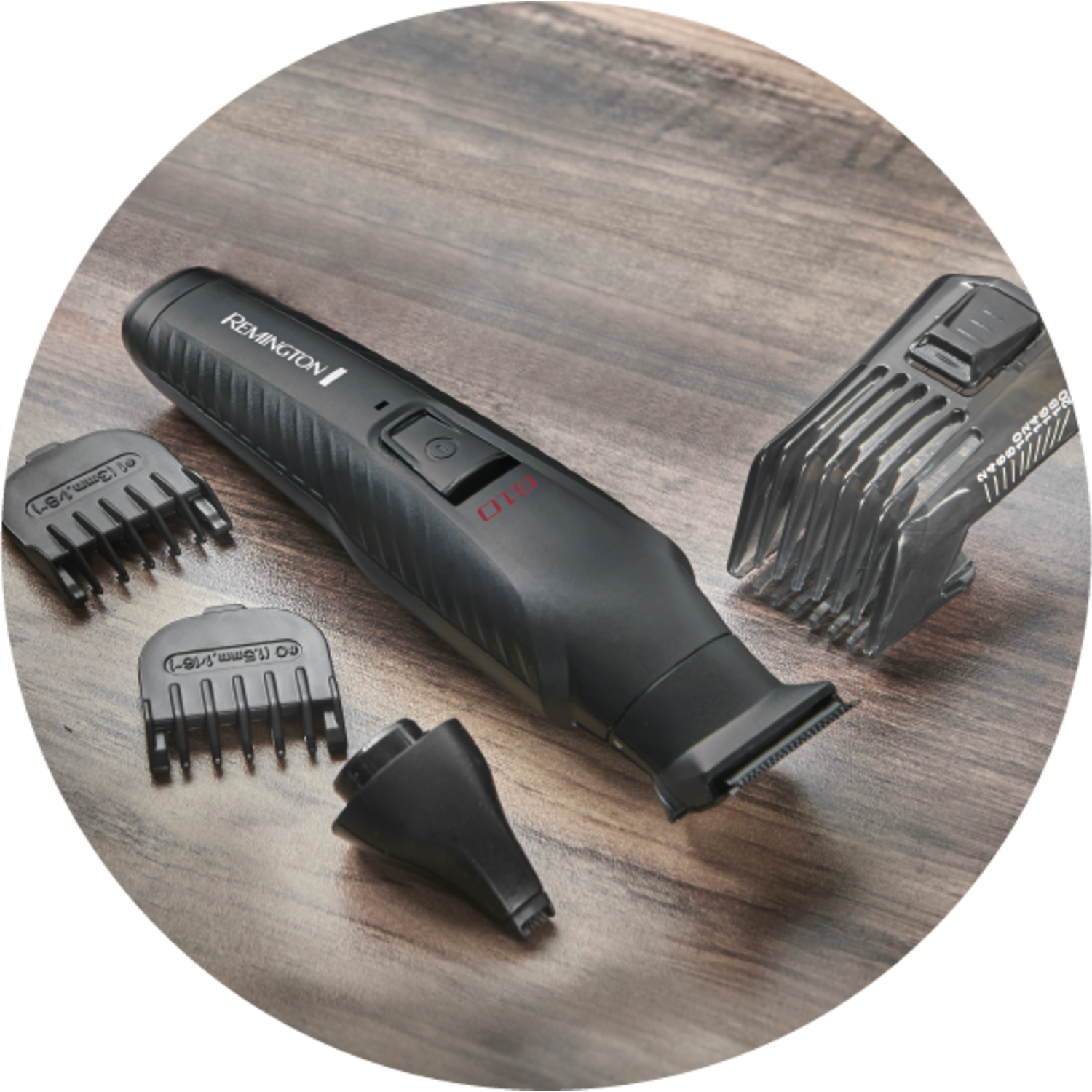Black Remington beard trimmer with attachments on a wooden surface, inside a circle.