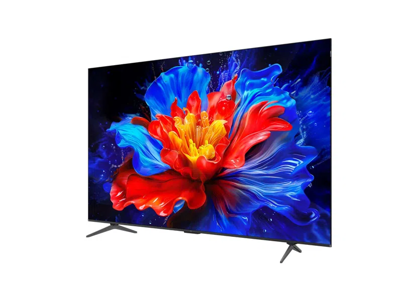 Ein großer Fernseher zeigt ein farbenfrohes Blumenbild. Der Fernseher ist schwarz, und der Bildschirm ist an.