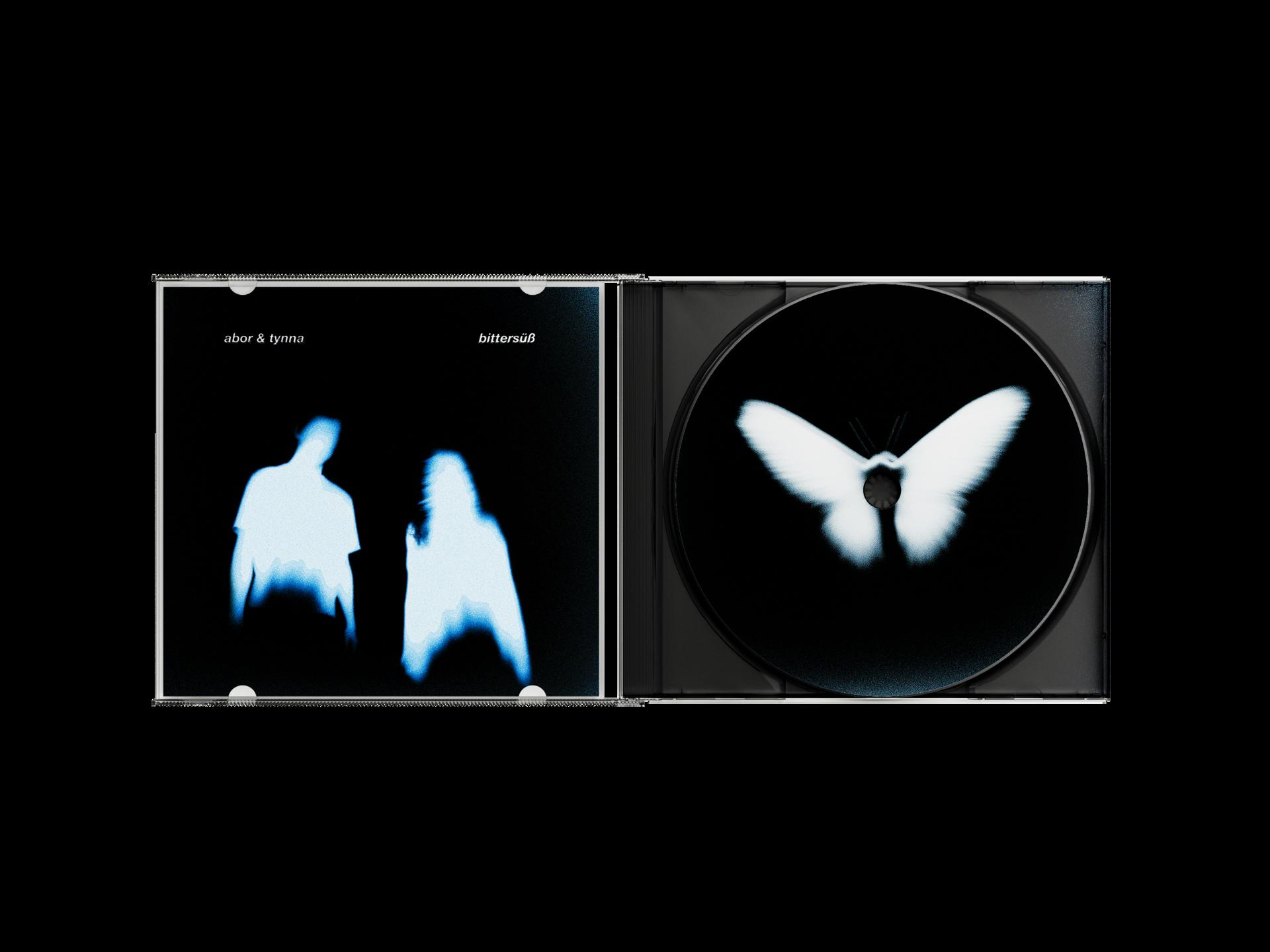 Geöffnete CD-Hülle mit CD und Cover-Art. Die Kunst zeigt einen weißen Schmetterling auf Schwarz.