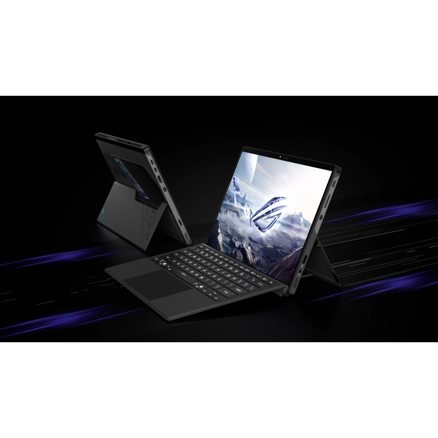Two black laptops on a dark surface. One is open, the other is closed. Purple light trails behind.