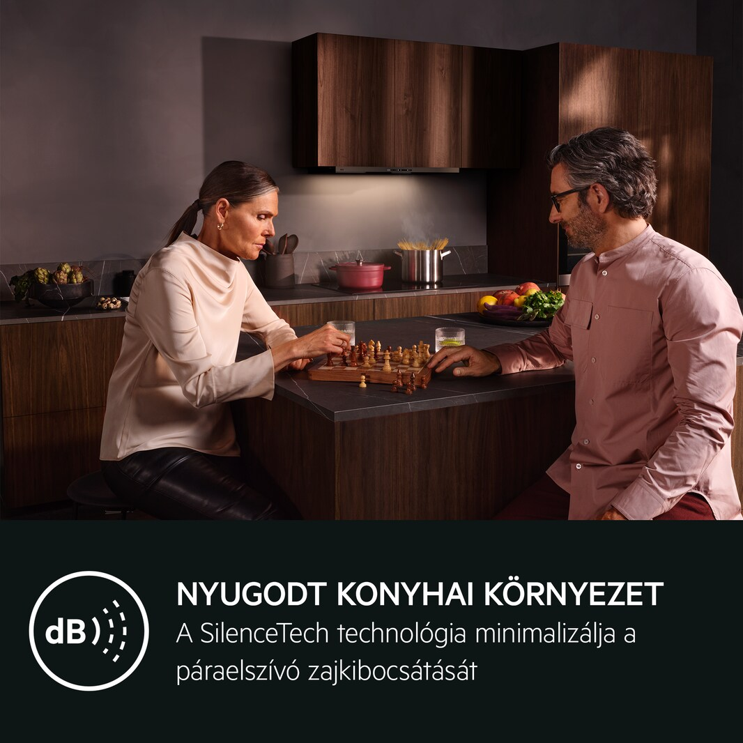 Fekete páraelszívó közeli képe, pirosan világító vezérlőkkel.