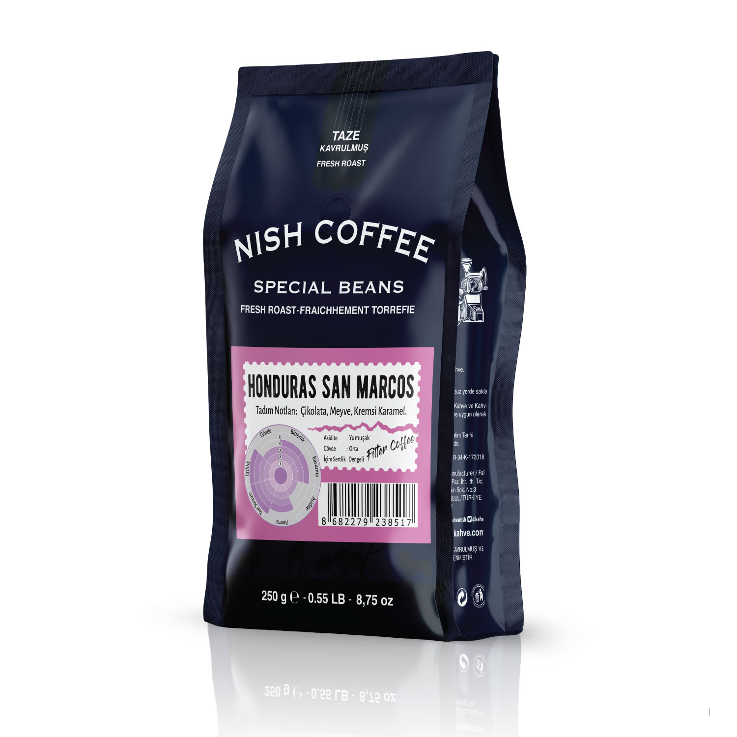 'Honduras San Marcos' etiketli siyah bir Nish Coffee çantası. Taze kavrulmuş kahve çekirdekleri.