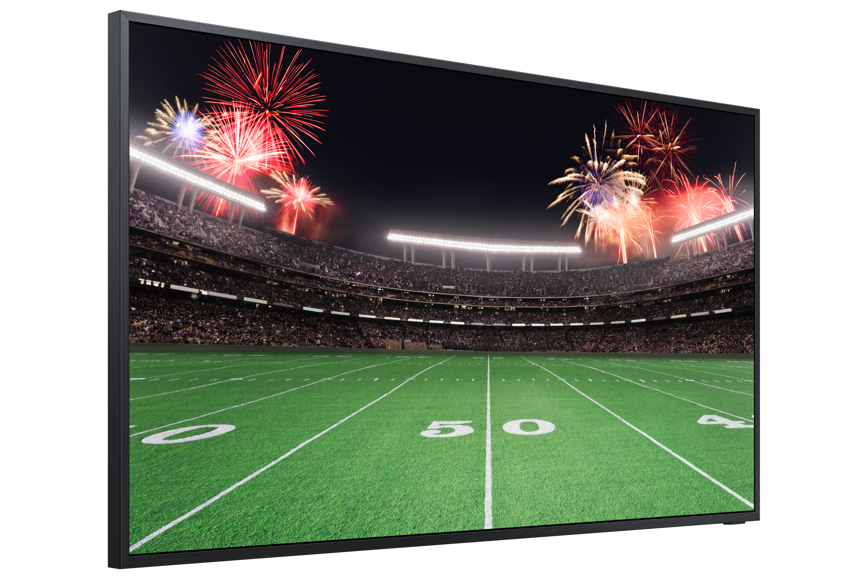 Großes Display mit einem Footballfeld, Feuerwerk bei Nacht und einer Stadionmenge.