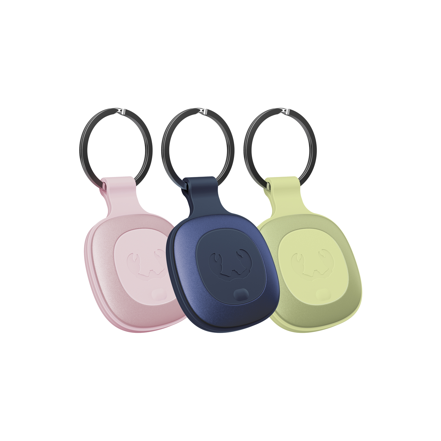 Drie sleutelhangers in roze, marineblauw en groen, elk met een kleine, afgeronde vorm.