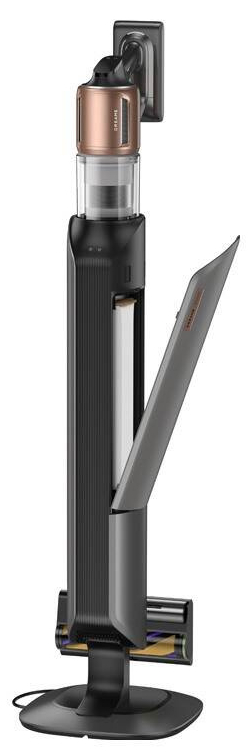 Czarny i brązowy odkurzacz stojący na podstawie, otwarty i gotowy.