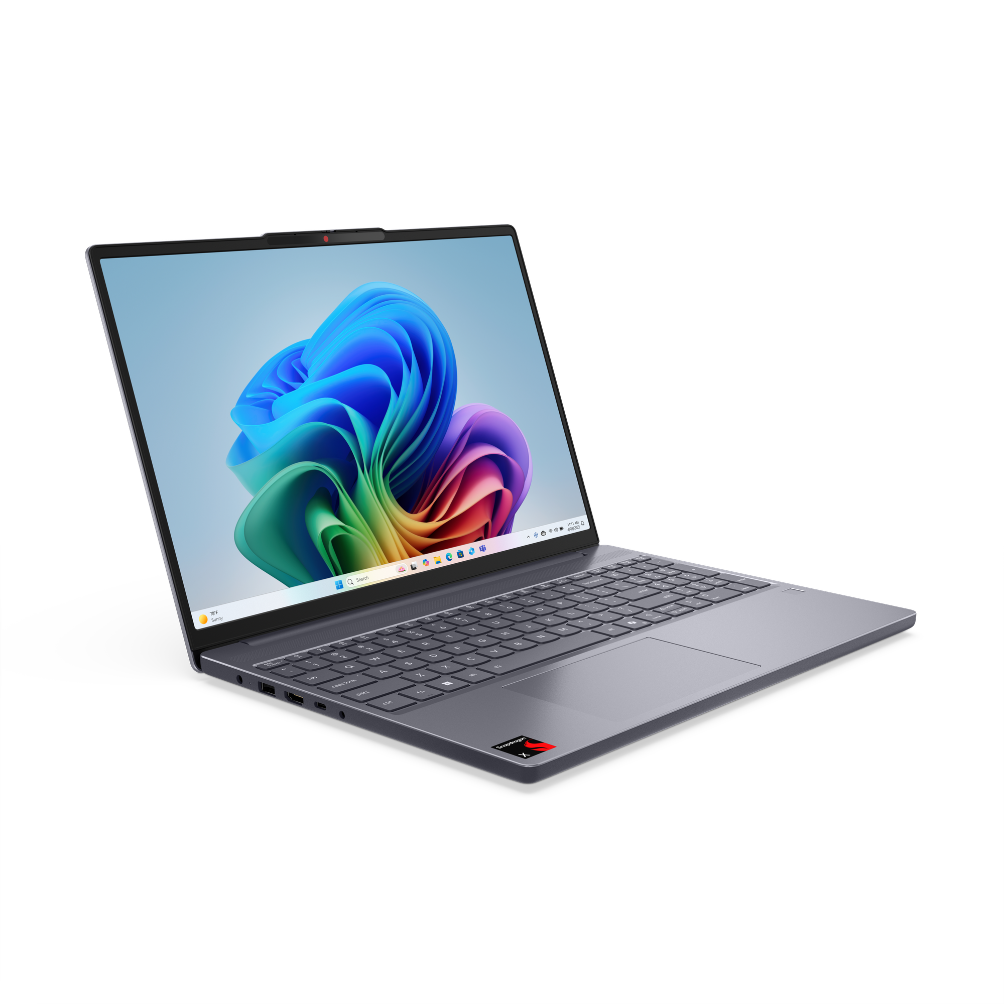 Ein grauer Laptop ist geöffnet und zeigt einen bunten, abstrakten Hintergrund. Schwarzer Hintergrund.