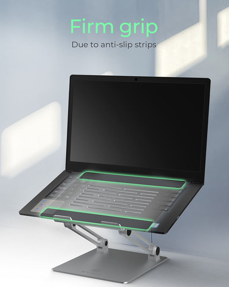 Ein Laptop steht auf einem silbernen Ständer, mit einem transparenten Bereich für die Tastatur und grünen Lichtern.