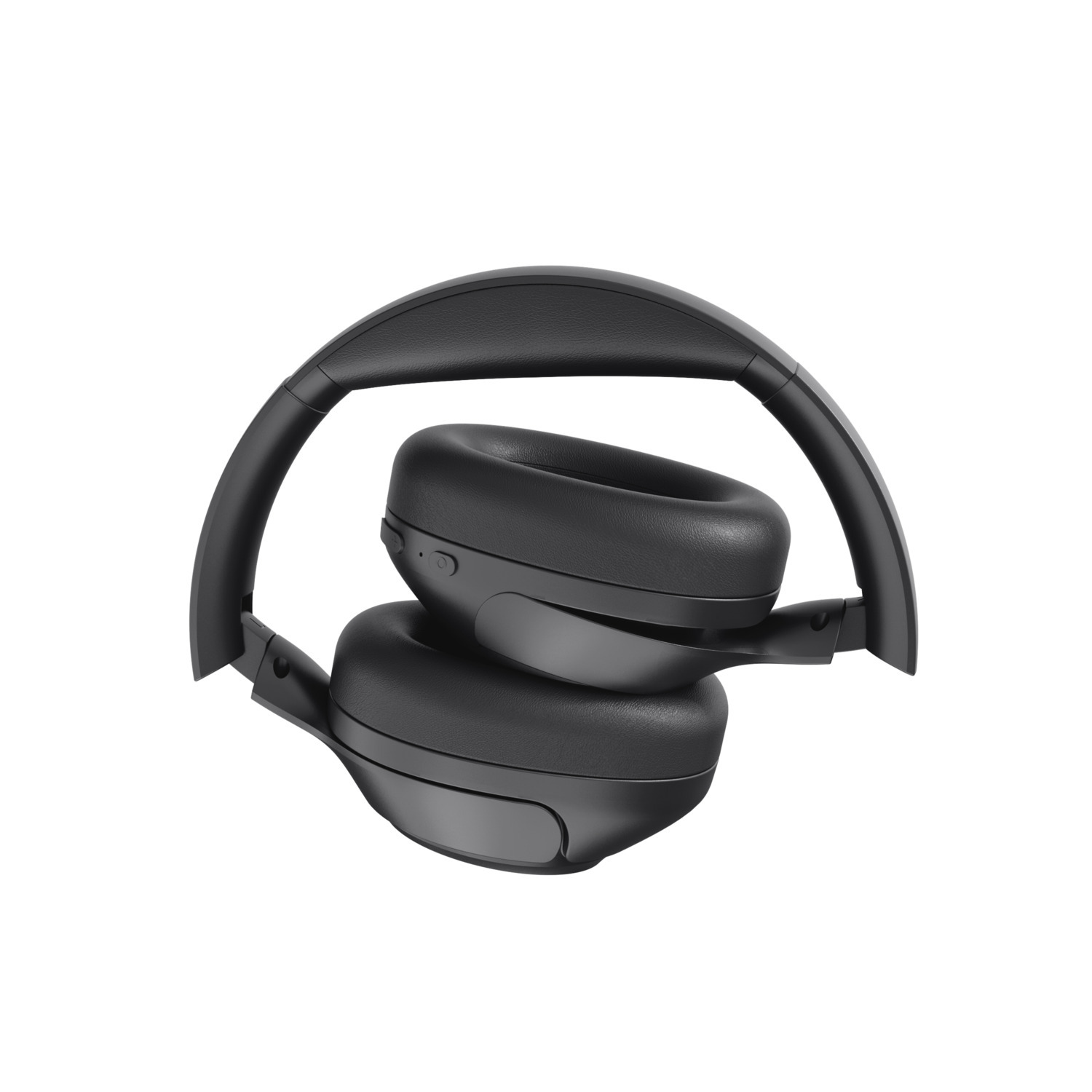 Casque noir plié. L'arceau est incurvé. Les écouteurs sont plats et se font face.