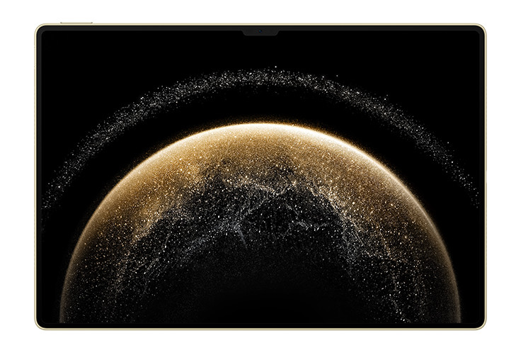 Tablet z czarnym ekranem wyświetlający złoty planet z kropkowanym pierścieniem. Czarne tło.