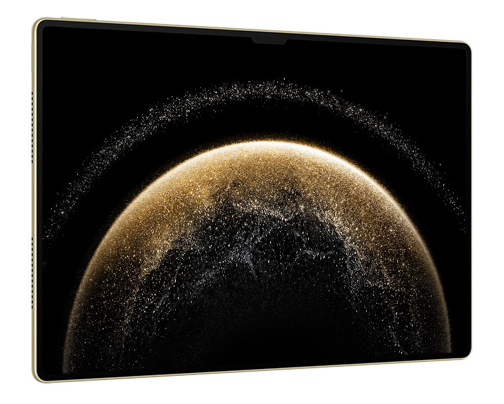 Tablet ze złotą ramką i ciemnym tłem. Wyświetlany jest wzór przypominający galaktykę.
