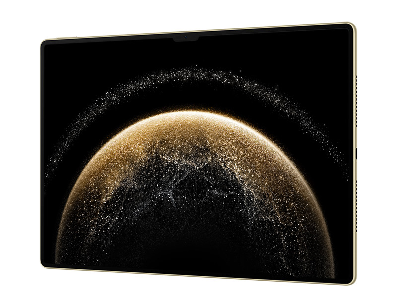 Tablet z abstrakcyjnym obrazem przypominającym planetę na ekranie.