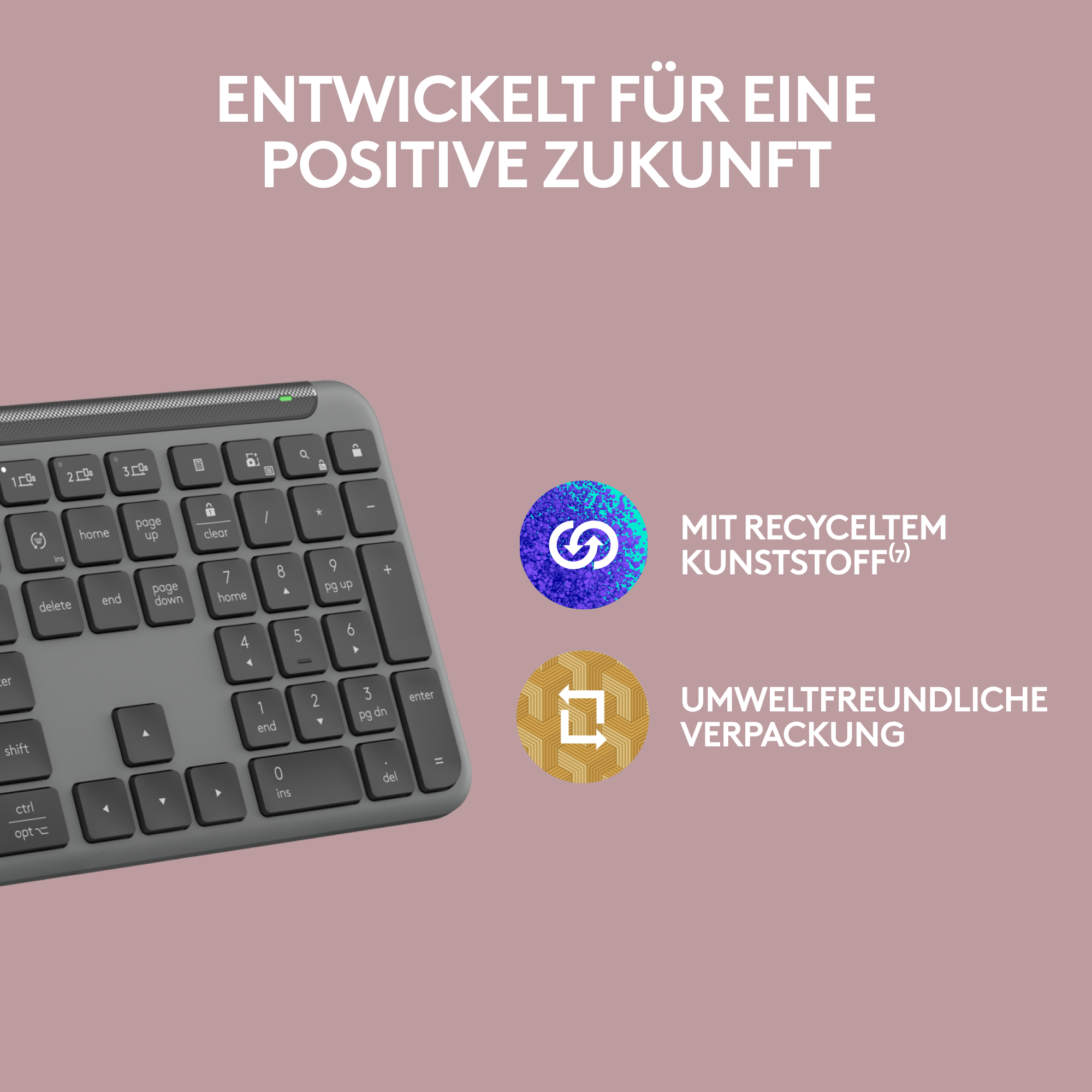 Graue Tastatur mit verschiedenen Tasten. Der Hintergrund hat zwei kreisförmige Bilder.