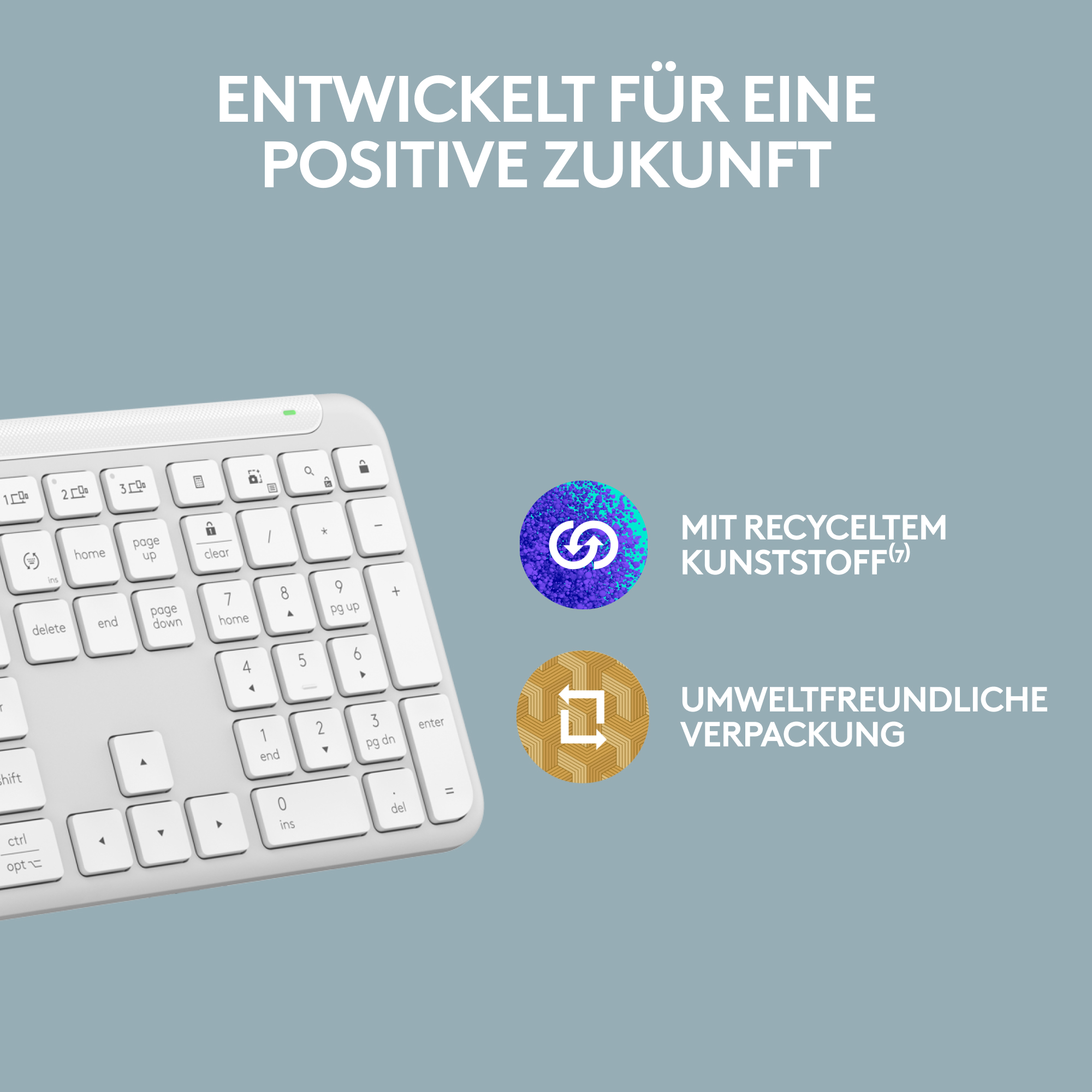 Eine weiße Tastatur mit weißem Rahmen, neben zwei kreisförmigen Symbolen und Text.