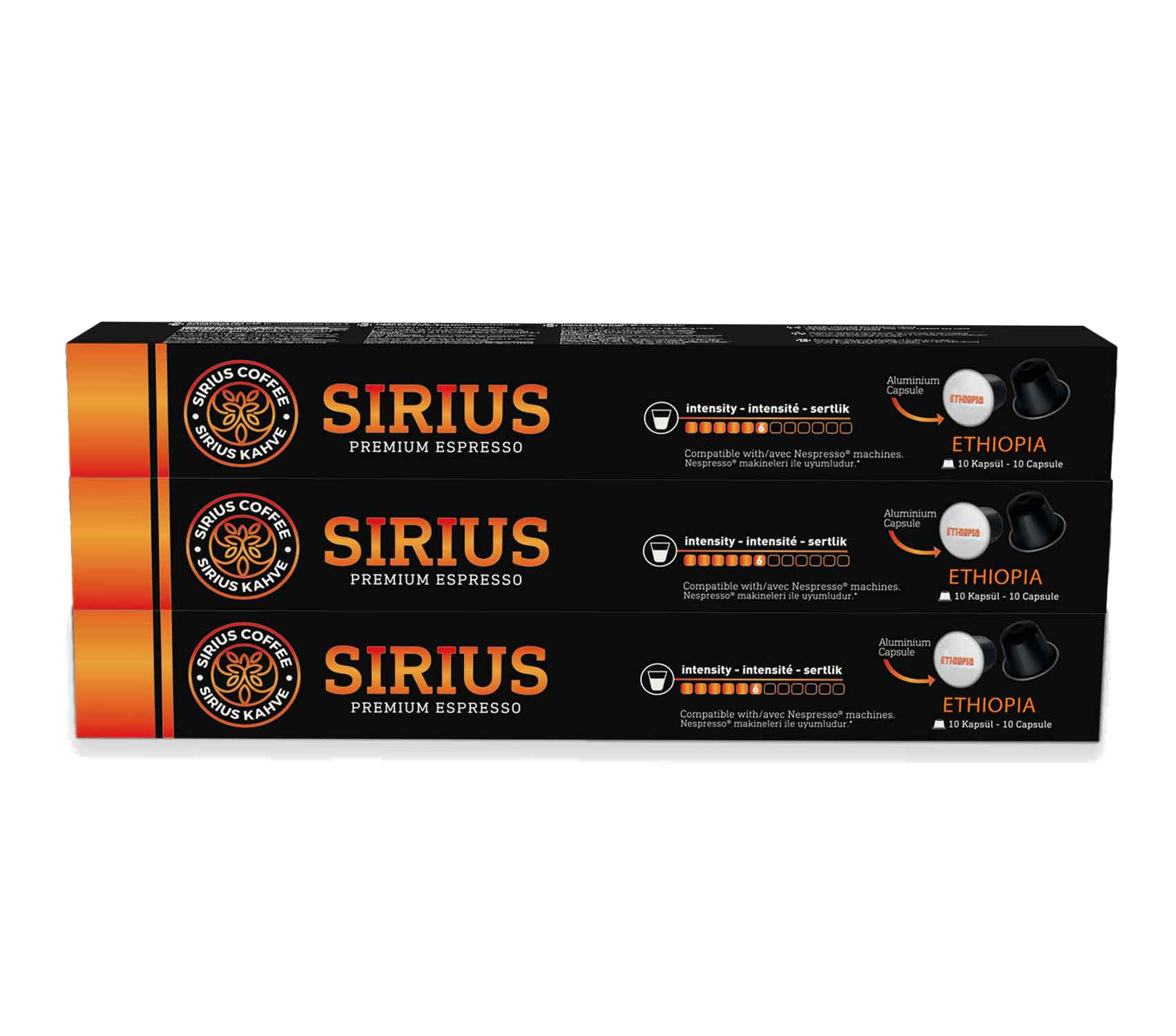 Üç kutu SIRIUS Premium Espresso kahve kapsülü. Kutular turuncu ve siyahtır.
