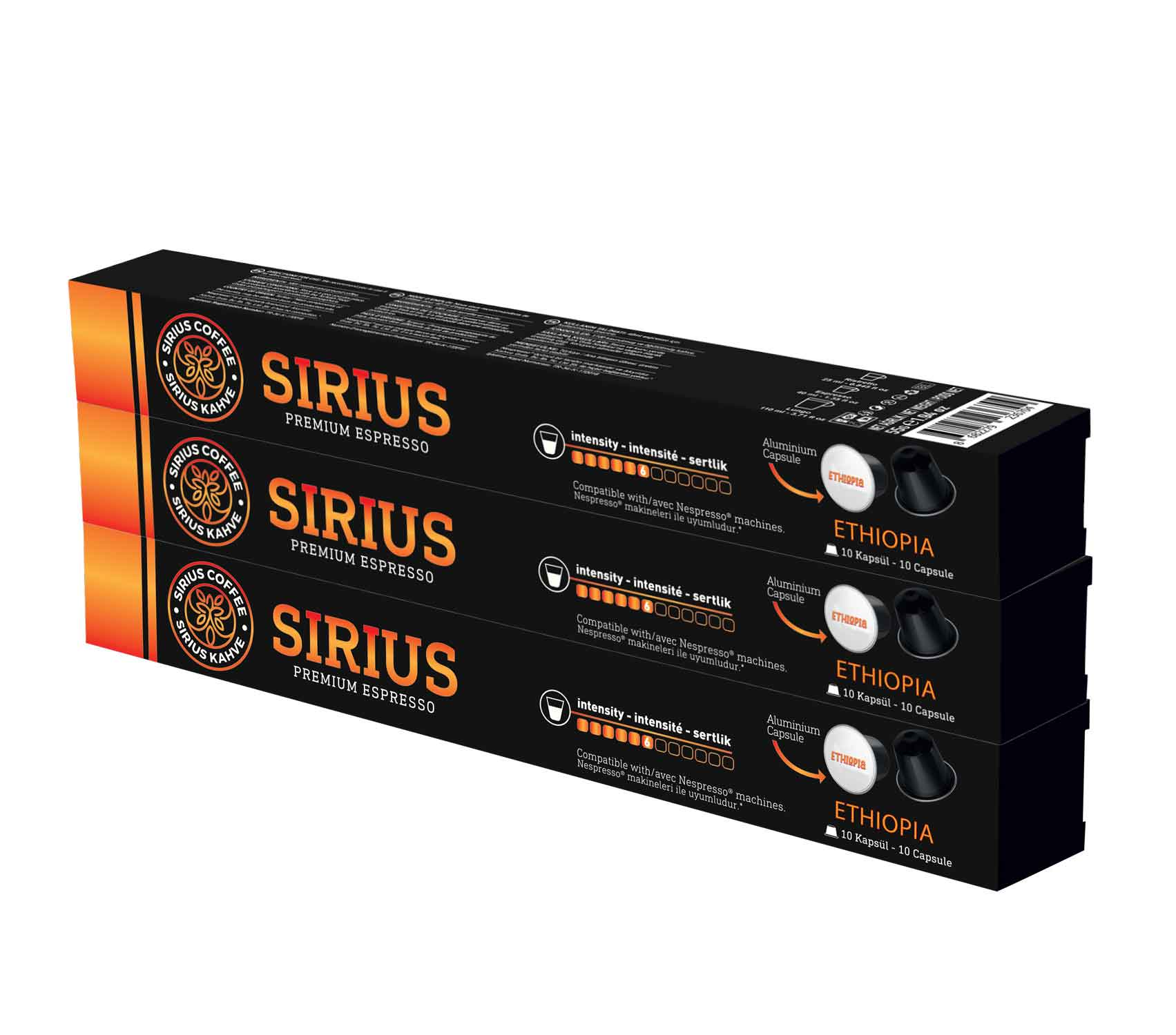 Üç kutu SIRIUS premium espresso kahve. Kutular turuncu ve siyah tasarıma sahip.