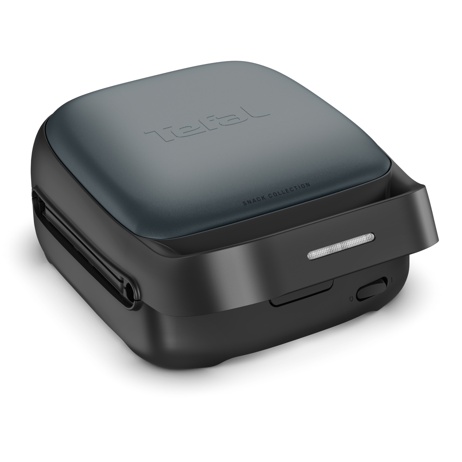 Black and gray Tefal snack maker, closed, with a handle and a light indicator.