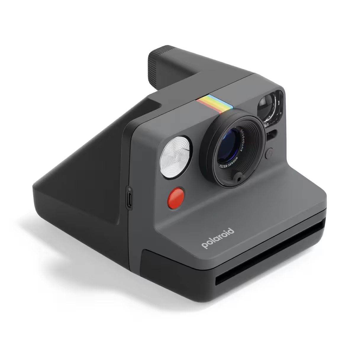 Una cámara Polaroid gris con una franja de arcoíris y un botón rojo.