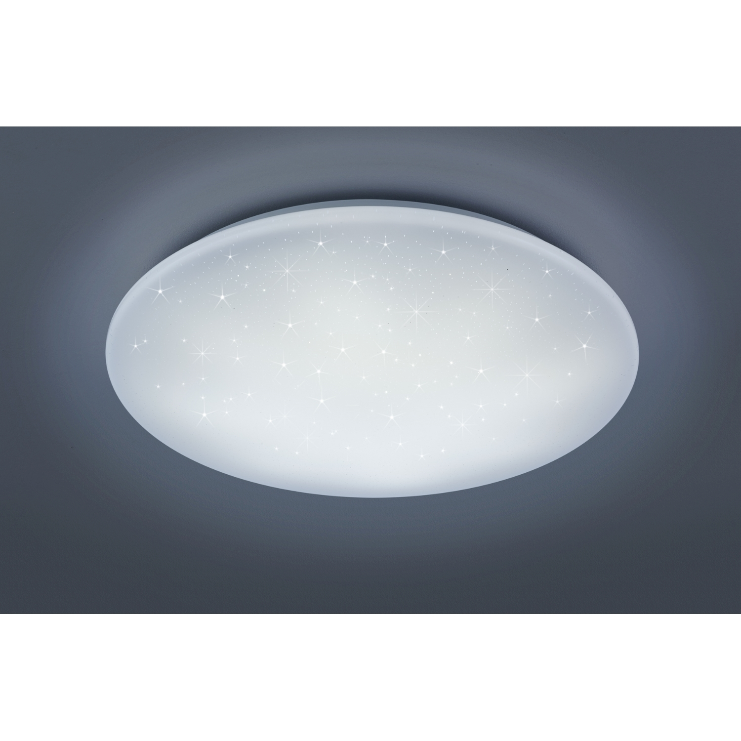 Lampada da soffitto rotonda con design a stelle su sfondo grigio scuro.