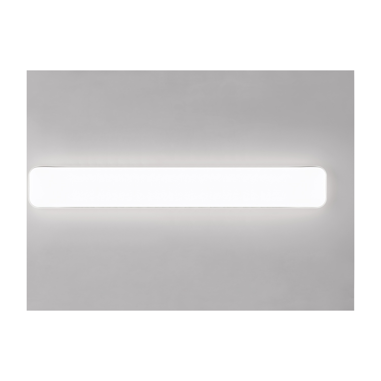 Plafoniera a LED rettangolare bianca su un muro grigio.