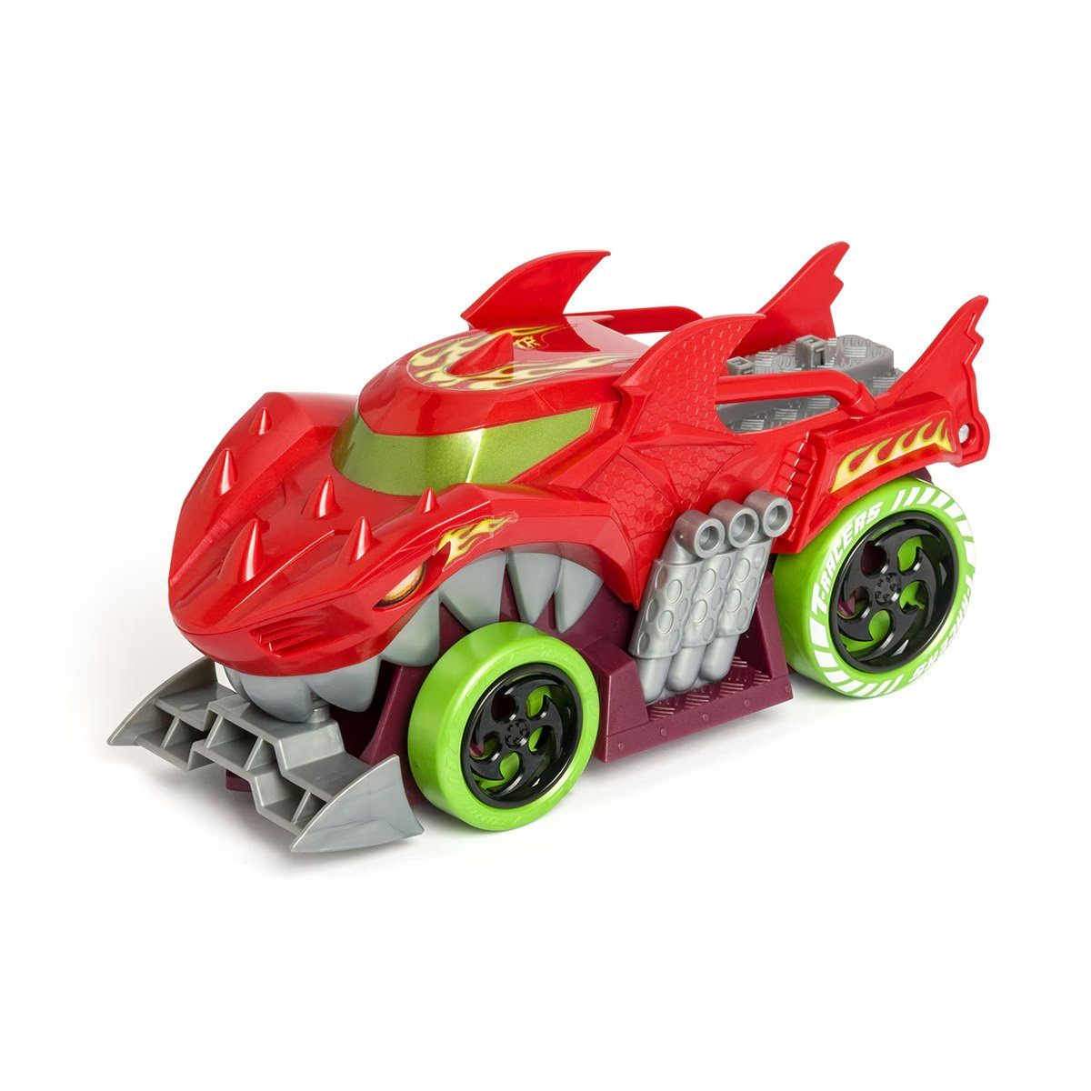 Coche de juguete rojo con diseño de tiburón, ruedas verdes. Es un juguete Hot Wheels, sobre una superficie blanca.