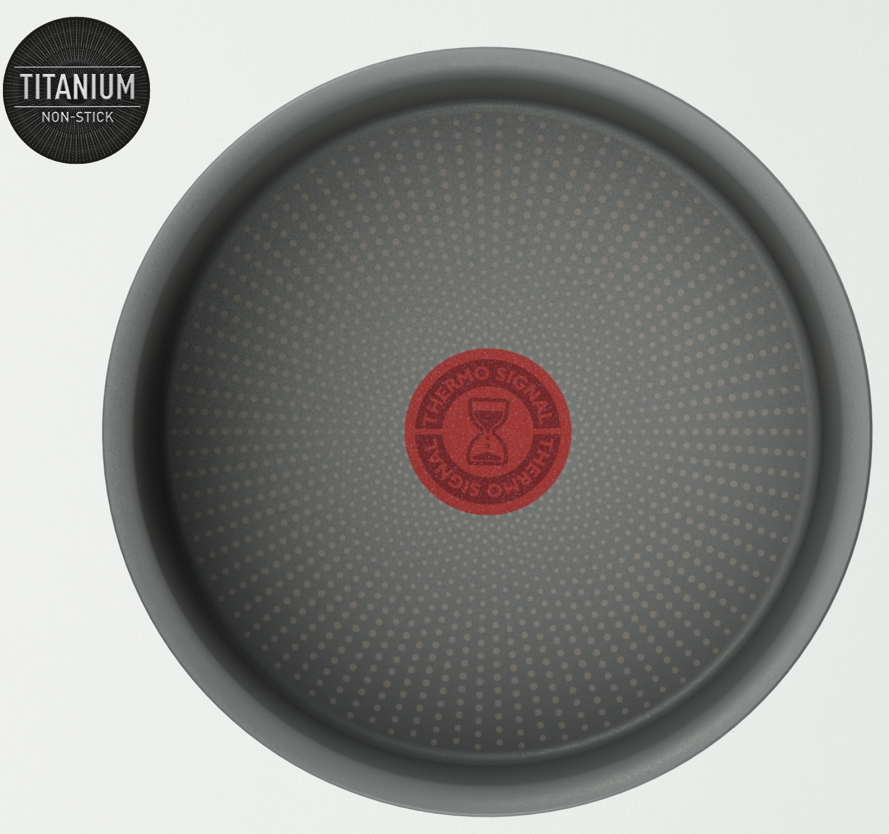 Widok z góry na szarą patelnię z czerwonym wskaźnikiem Thermo-Signal. Powierzchnia nieprzywierająca.