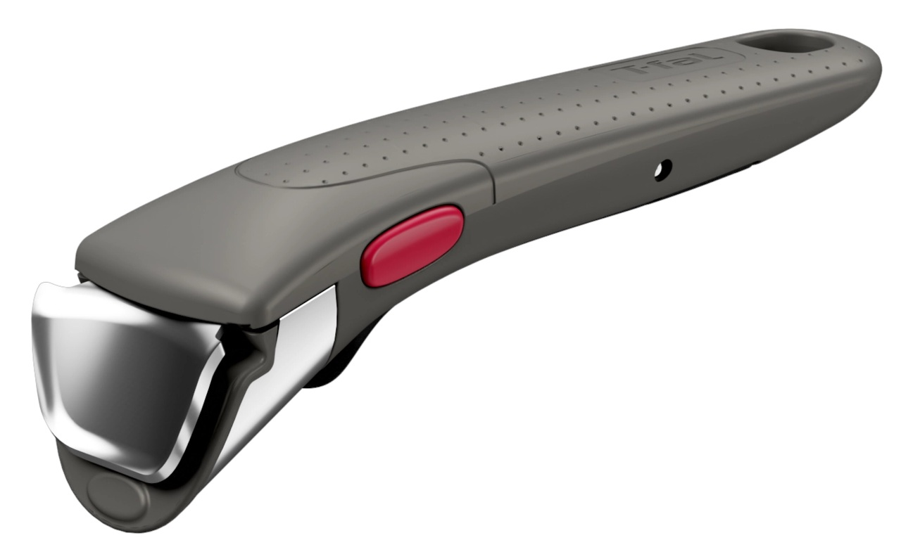 Odłączany szary uchwyt patelni z czerwonym przyciskiem zwalniającym i srebrnym metalowym mechanizmem blokującym.