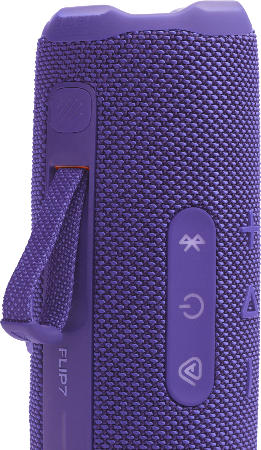 A lila JBL Flip 7 hordozható hangszóró közelképe. Van rajta egy pánt és vezérlőgombok.