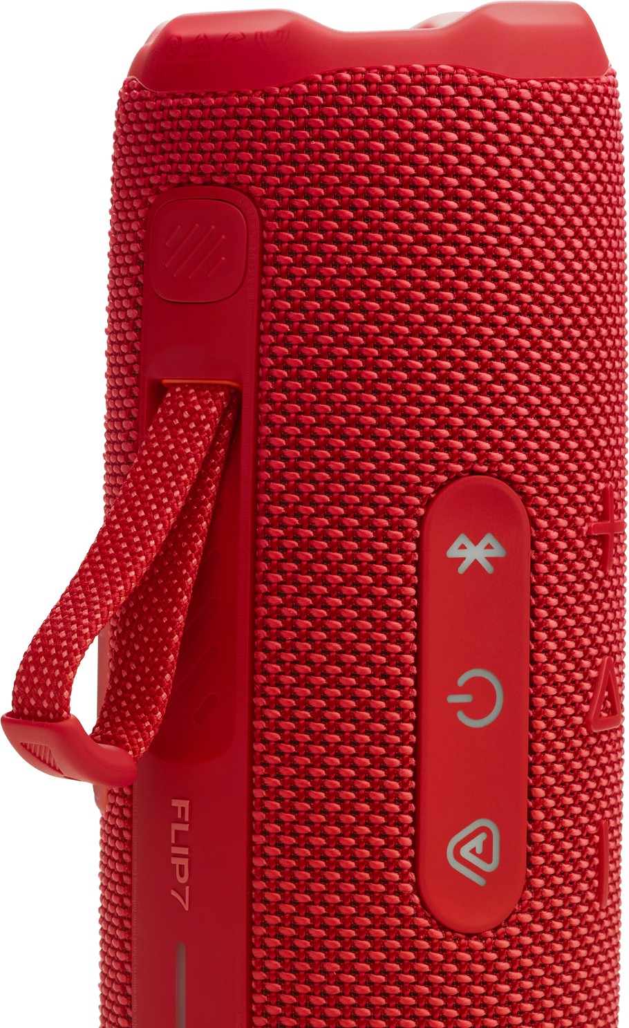 Egy piros, texturált Bluetooth hangszóró közeli képe vezérlőgombokkal.