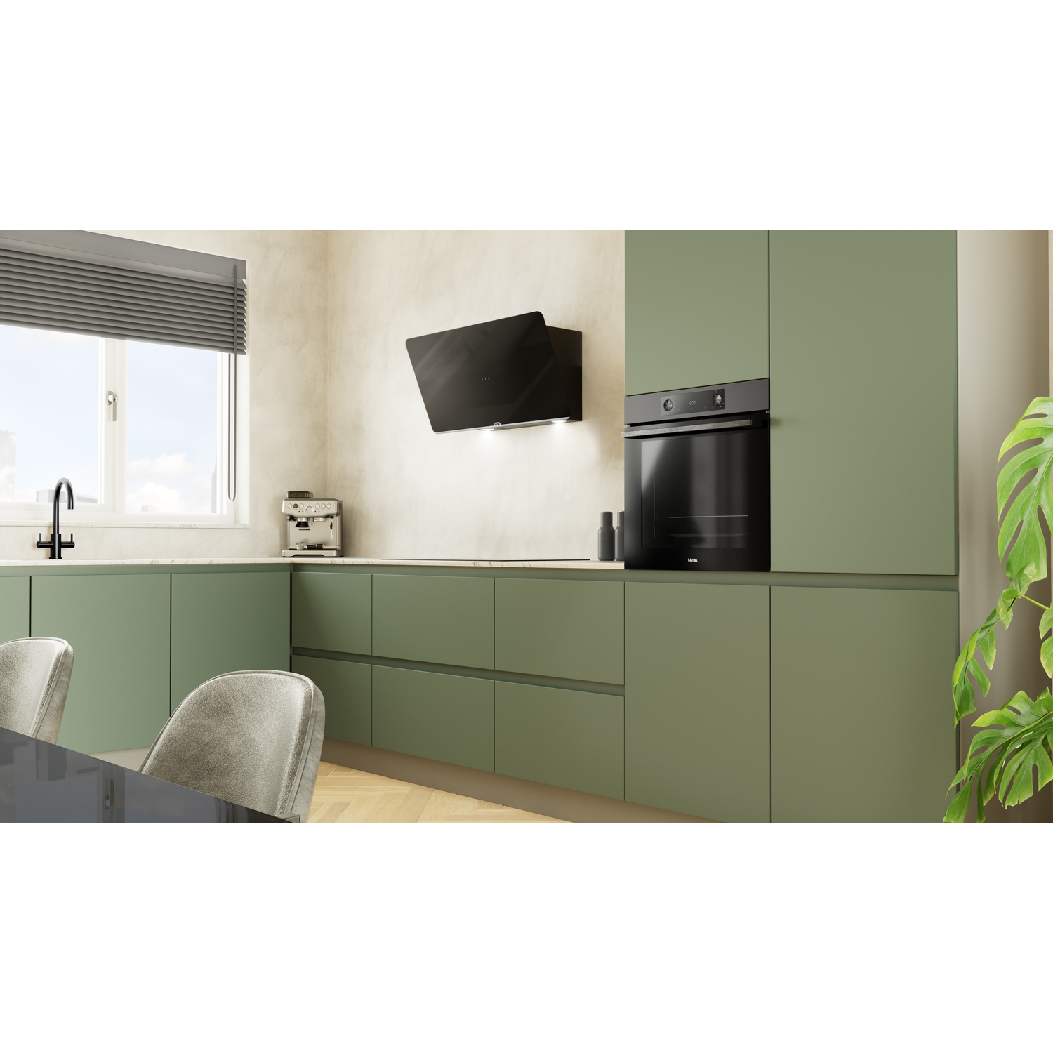 Modern kitchen with green cabinets, black appliances, and a window with blinds.