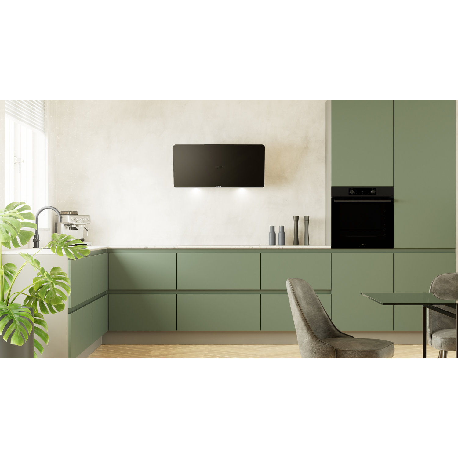 A modern kitchen with green cabinets and a black oven.