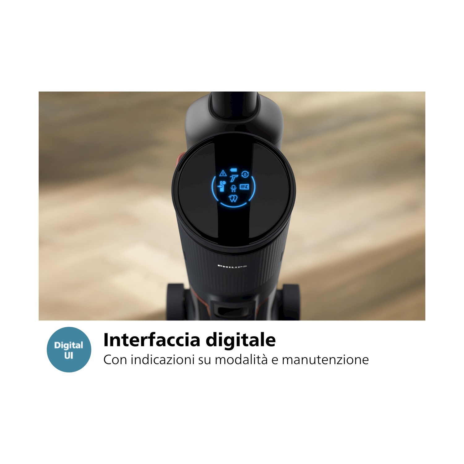 Display nero dell'aspirapolvere con icone. Sfondo: pavimento in legno.