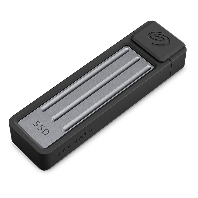 Una unidad SSD negra. Tiene una parte superior plateada con tres líneas.