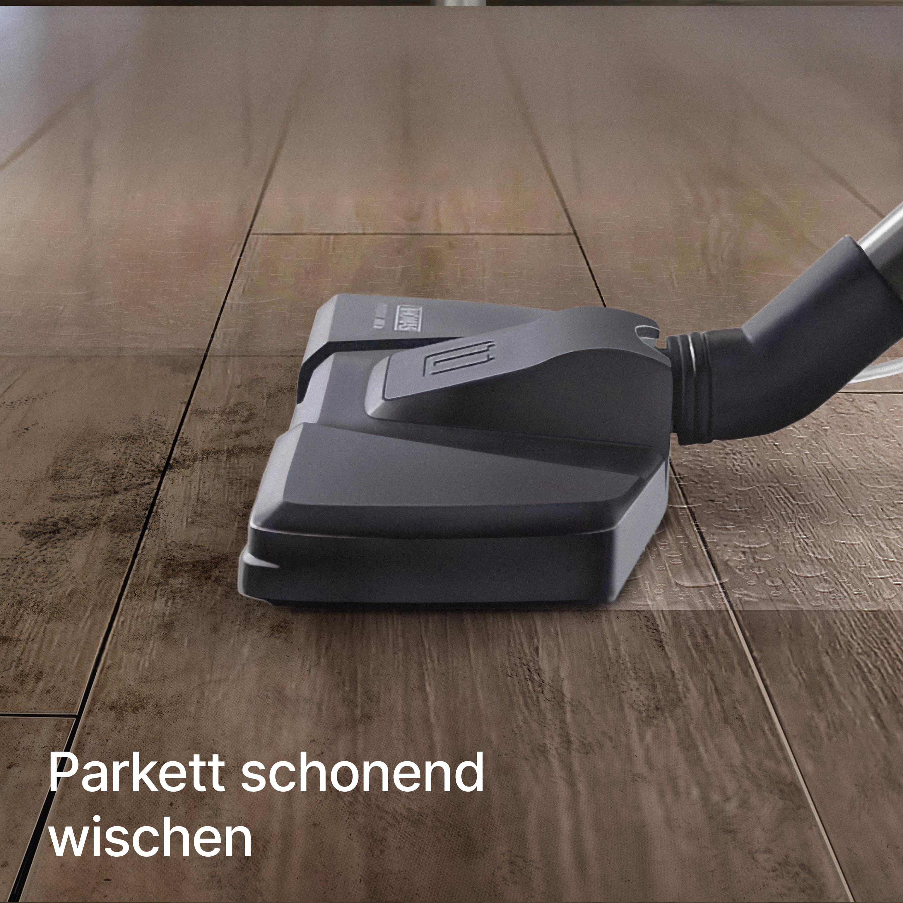 Ein Staubsaugerkopf reinigt einen Holzboden, Text sagt 'Parkett schonend wischen'.