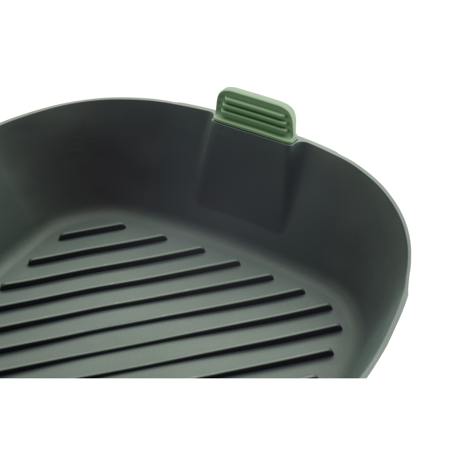 Close-up of a dark green grill pan with ridges and a green handle, isolated on white.