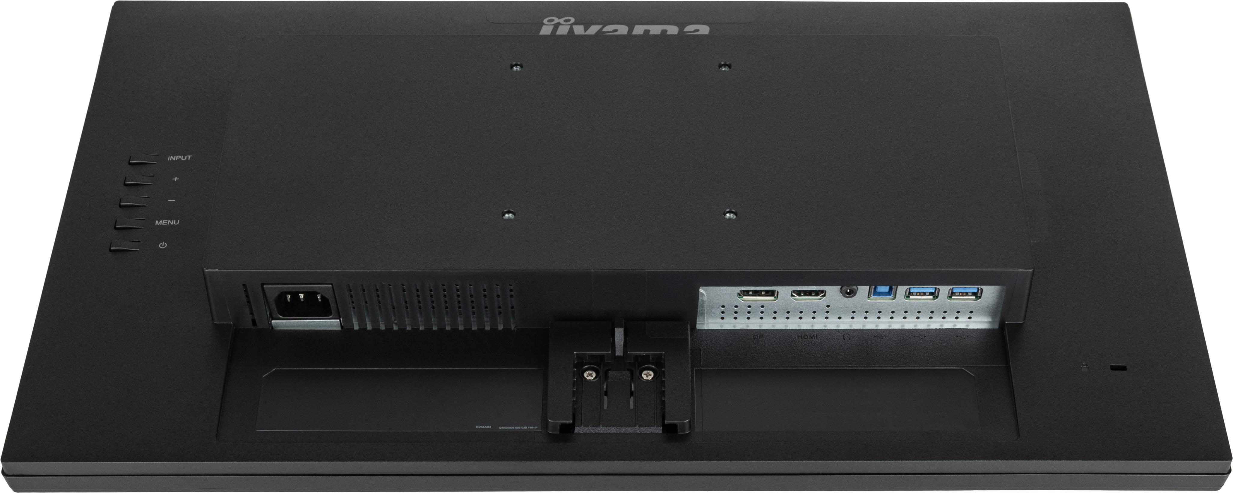 Rückseite eines schwarzen Computermonitors mit Anschlüssen. Schwarzer Hintergrund.
