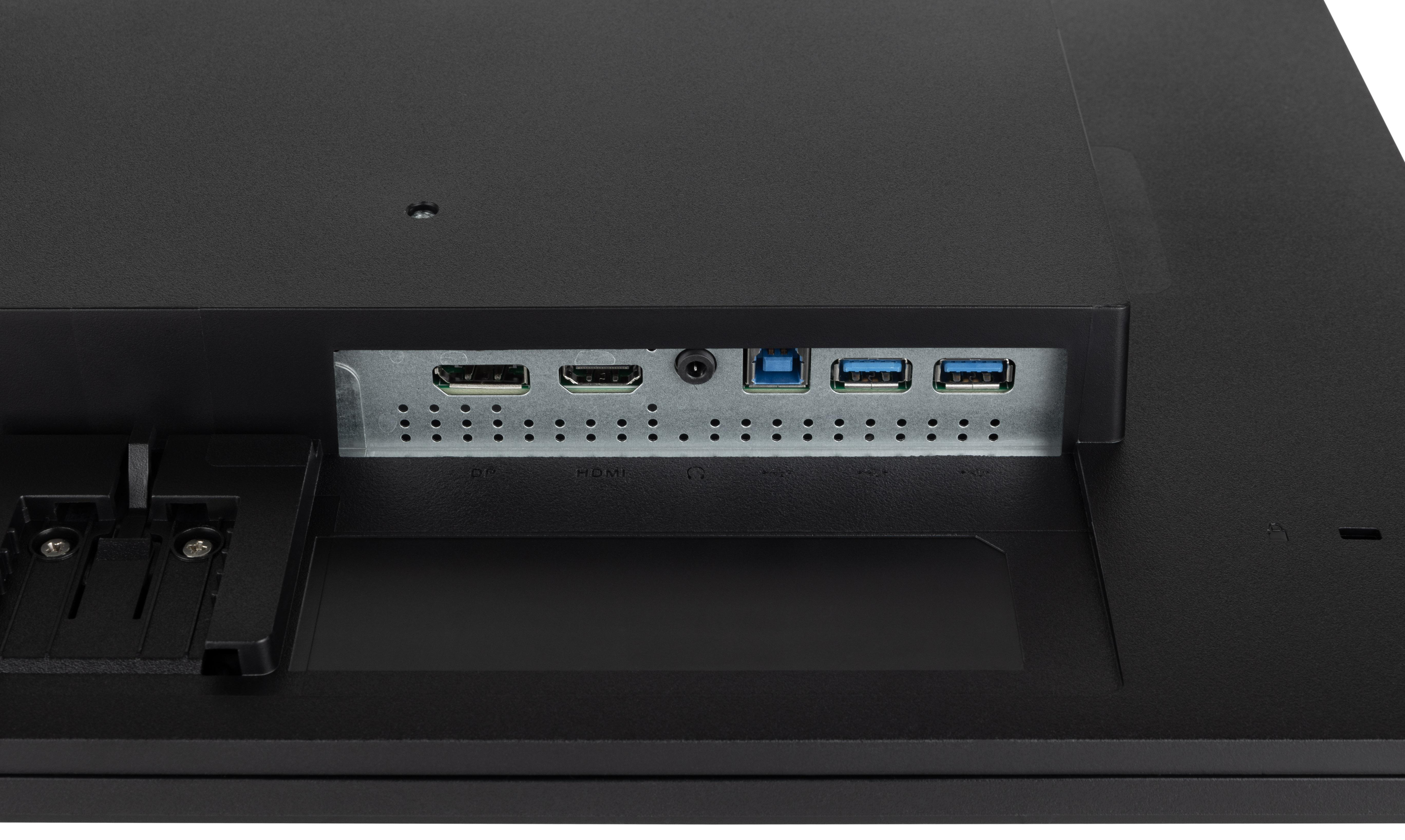 Nahaufnahme der Rückseite eines schwarzen Monitors mit Anschlüssen für verschiedene Verbindungen.
