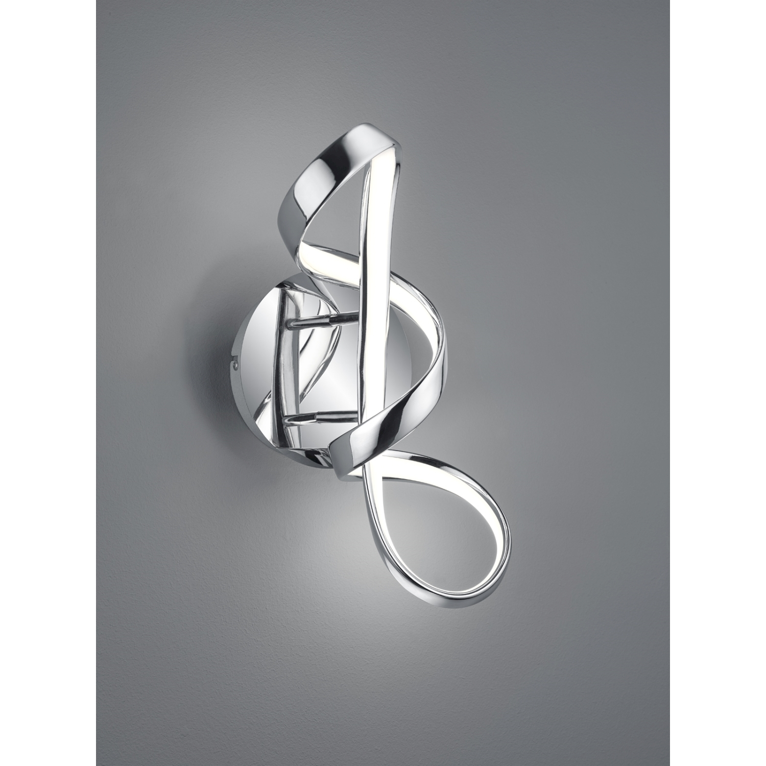 Lampada da parete cromata a forma di nota musicale.