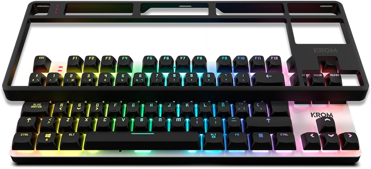 Un teclado gaming KROM negro y colorido con múltiples teclas y un marco superior.