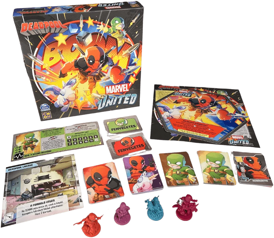 Marvel United Deadpool társasjáték kártyákkal, miniatúrákkal és dobozművészettel fehér háttéren.