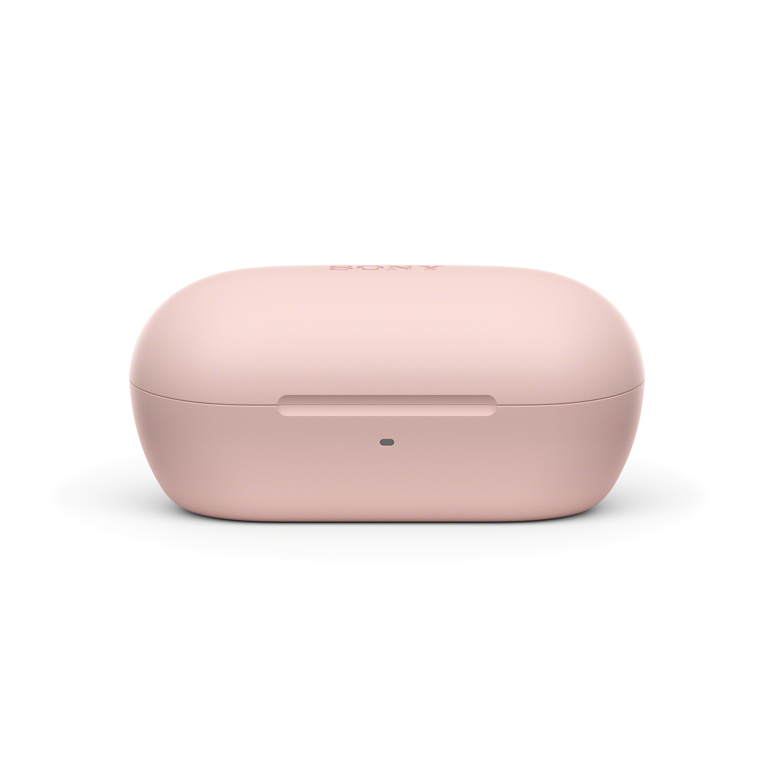 Una funda de carga de auriculares rosa. La palabra SONY está impresa en la parte superior de la funda.