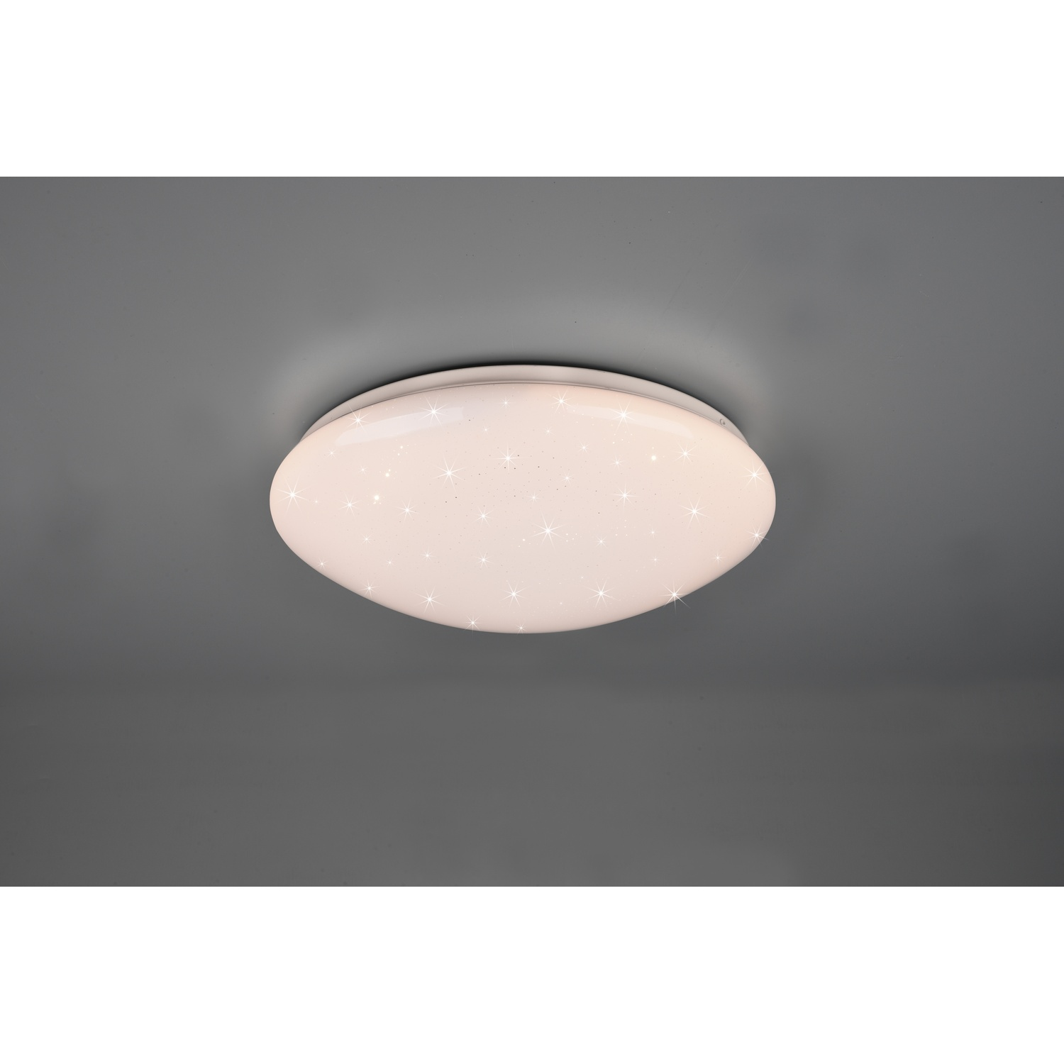 Lampada da soffitto ovale bianca con stelle brillanti, su sfondo grigio scuro.