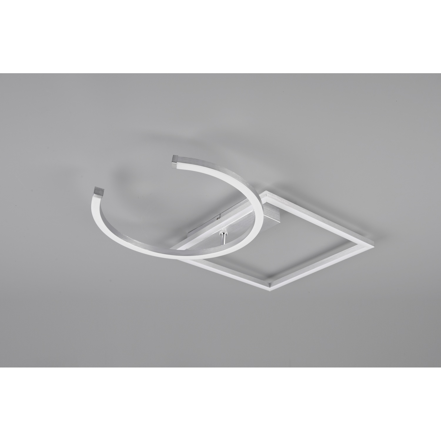Lampada da soffitto bianca moderna con forma quadrata e curva. Sfondo grigio.