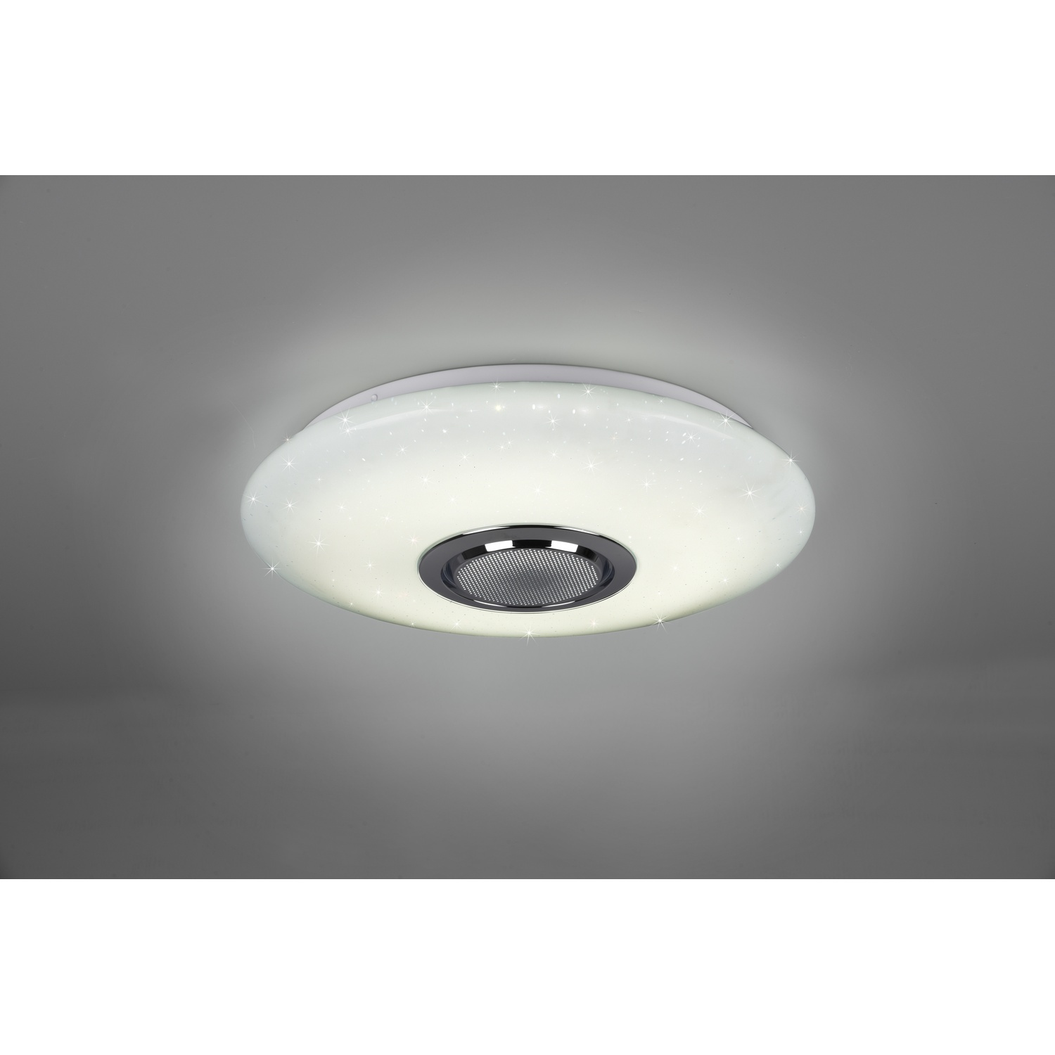 Una lampada da soffitto con un design stellato e un altoparlante rotondo.