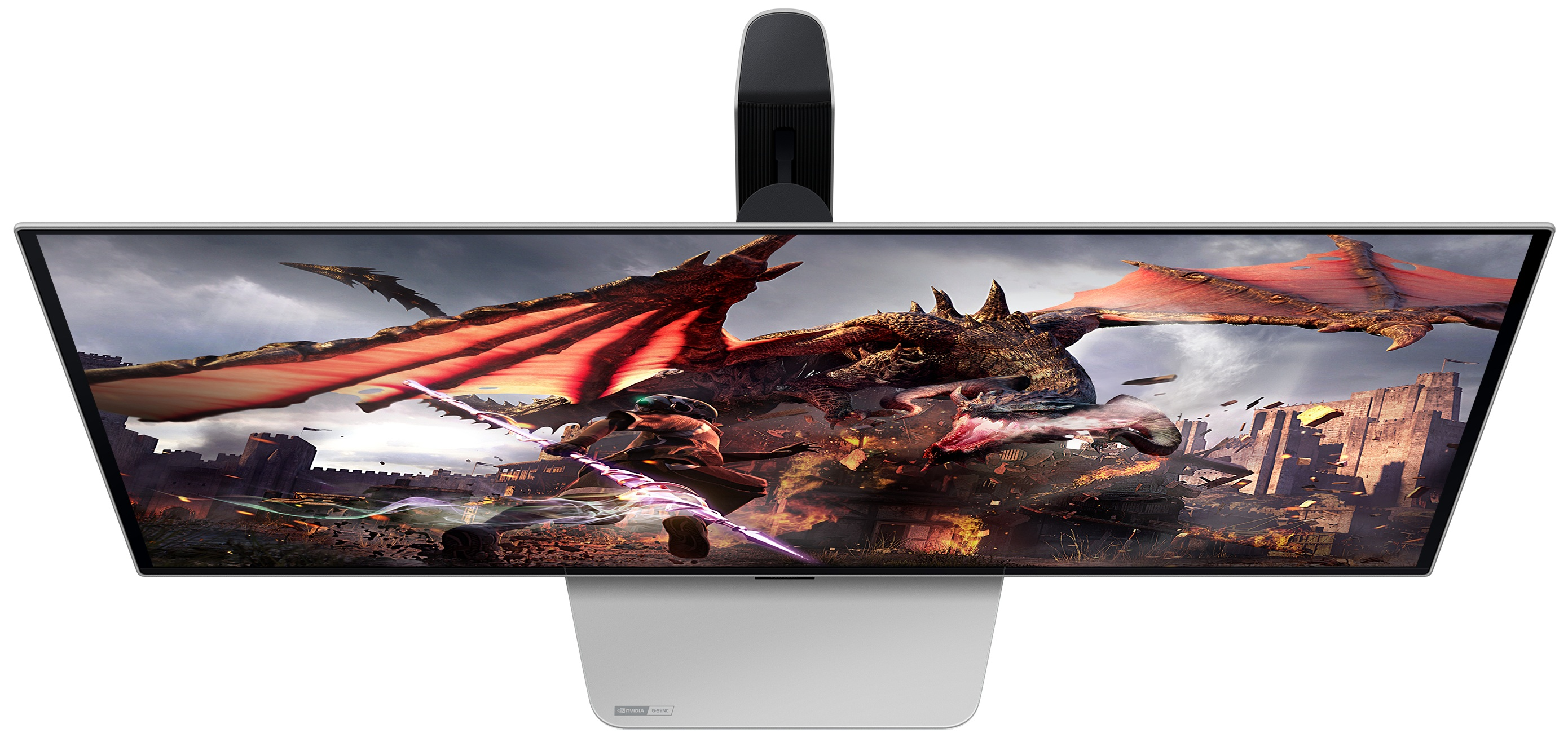 Monitor komputera wyświetla scenę ze smokiem i wojownikiem.