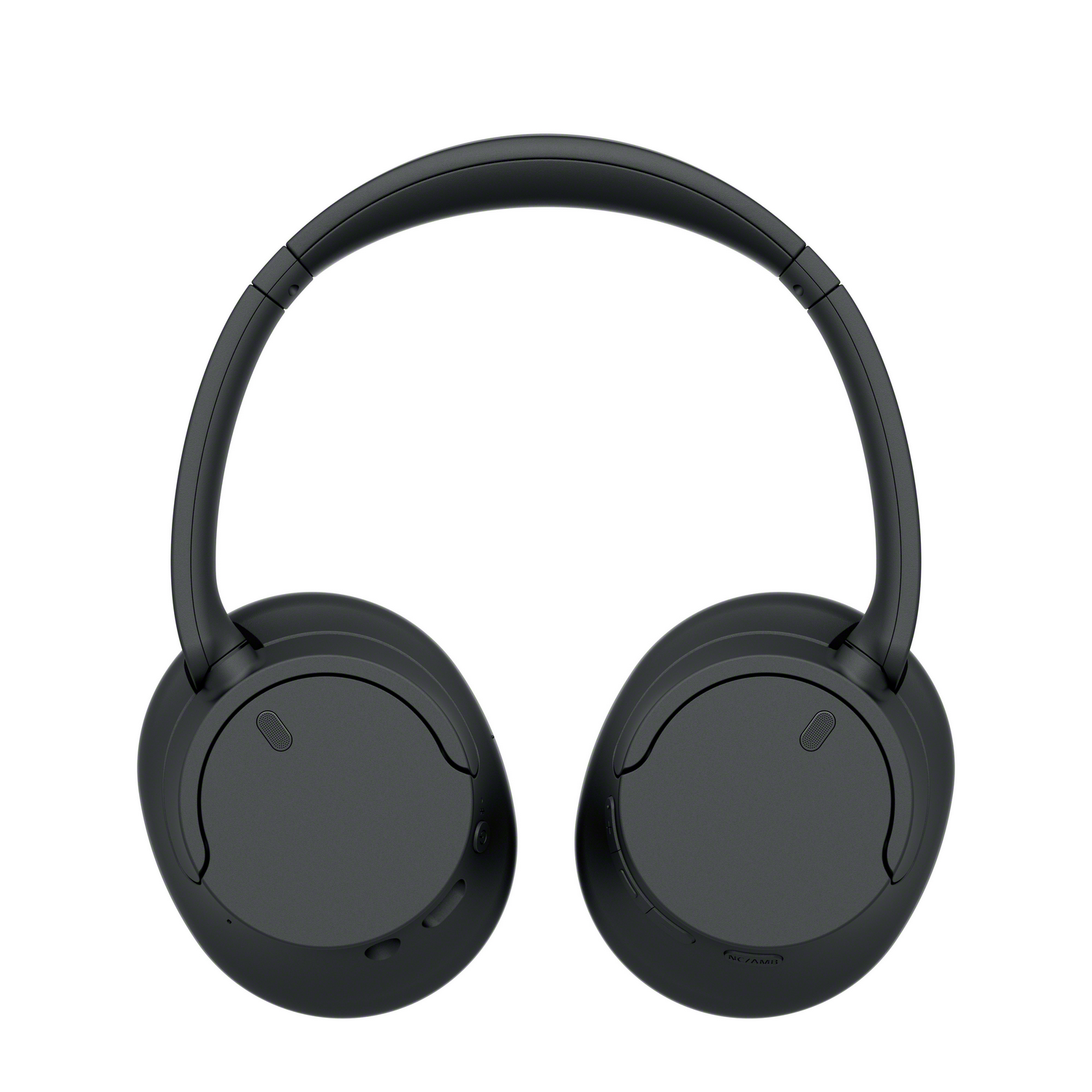 Auriculares negros, estilo over-ear, sobre un fondo blanco. La diadema está arqueada.