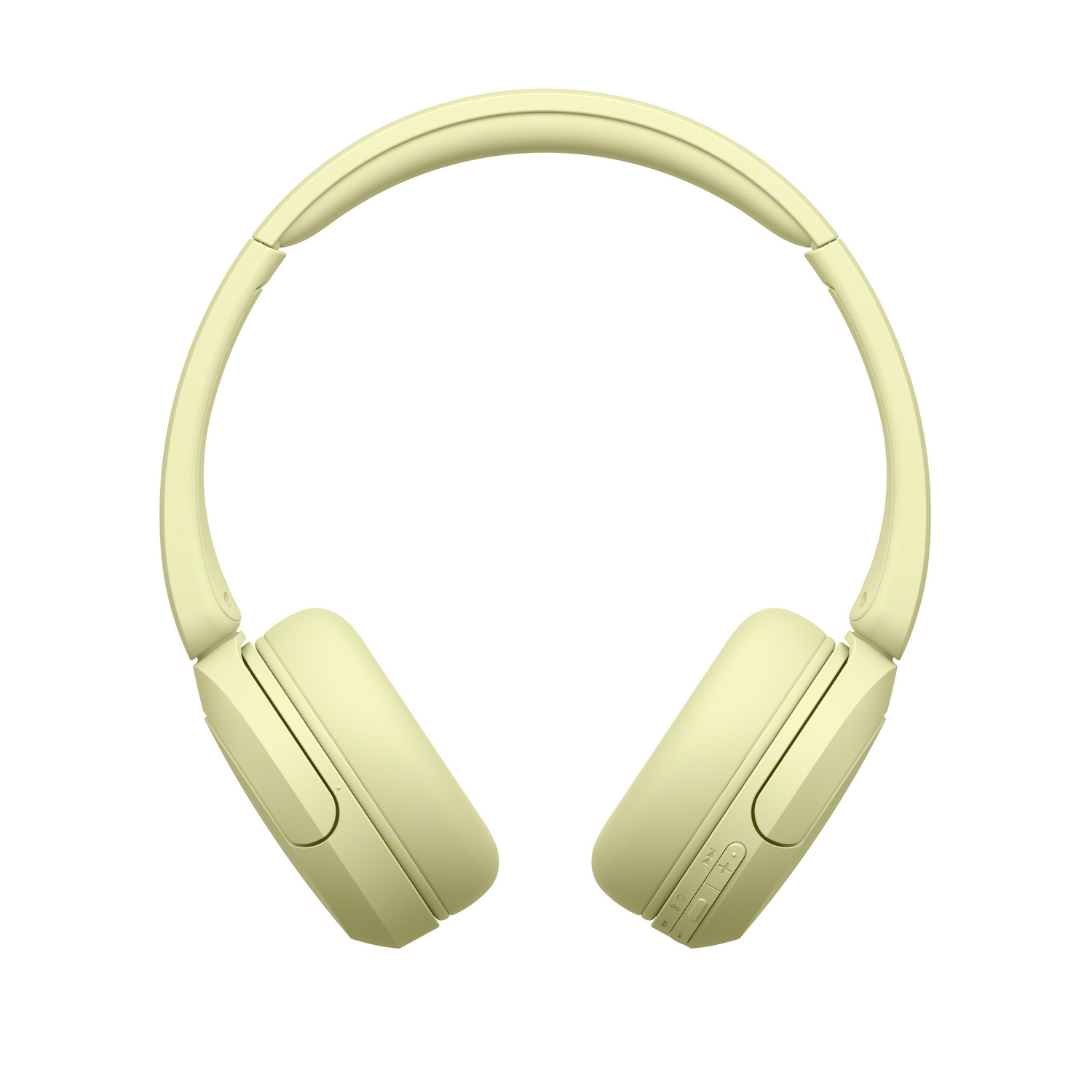 Auriculares amarillos sobre fondo blanco. Vista superior de audífonos con almohadillas y diadema.