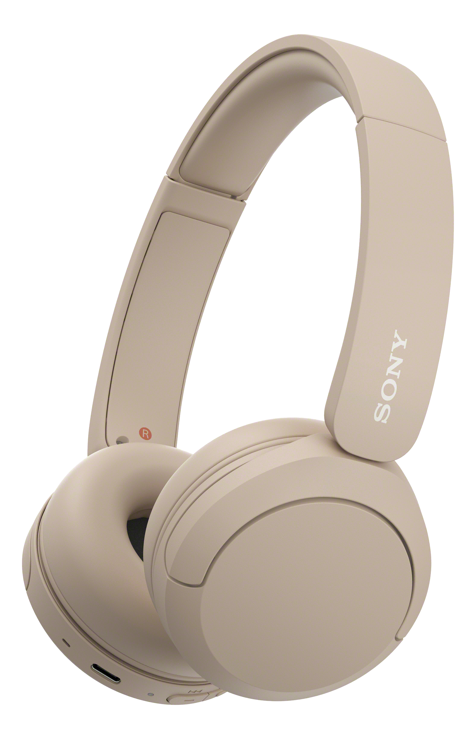 Cuffie sovraurali beige. Le cuffie hanno padiglioni e un archetto imbottito, con il logo Sony visibile.