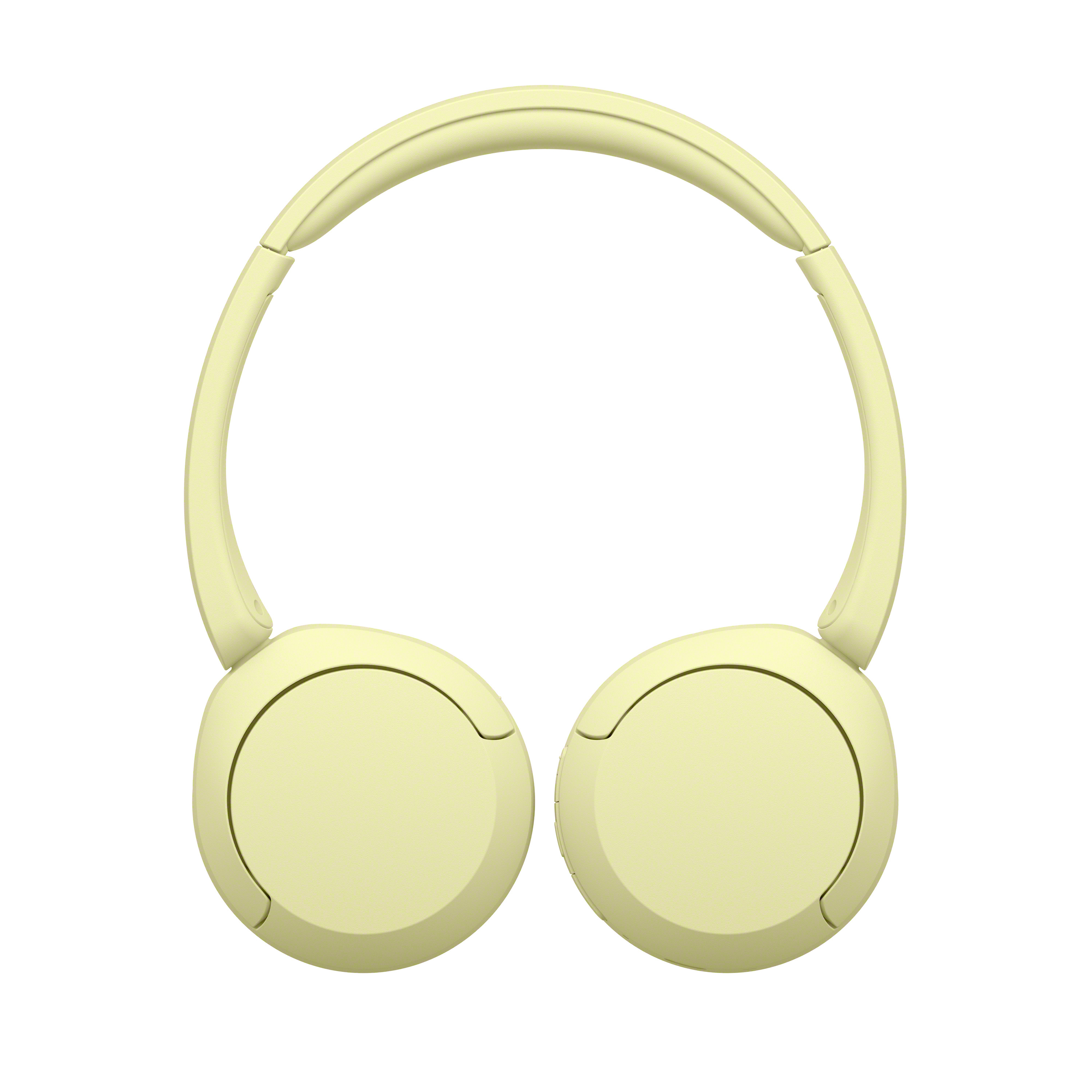 Casque jaune sur fond blanc. Vue de dessus du casque avec oreillettes et bandeau.