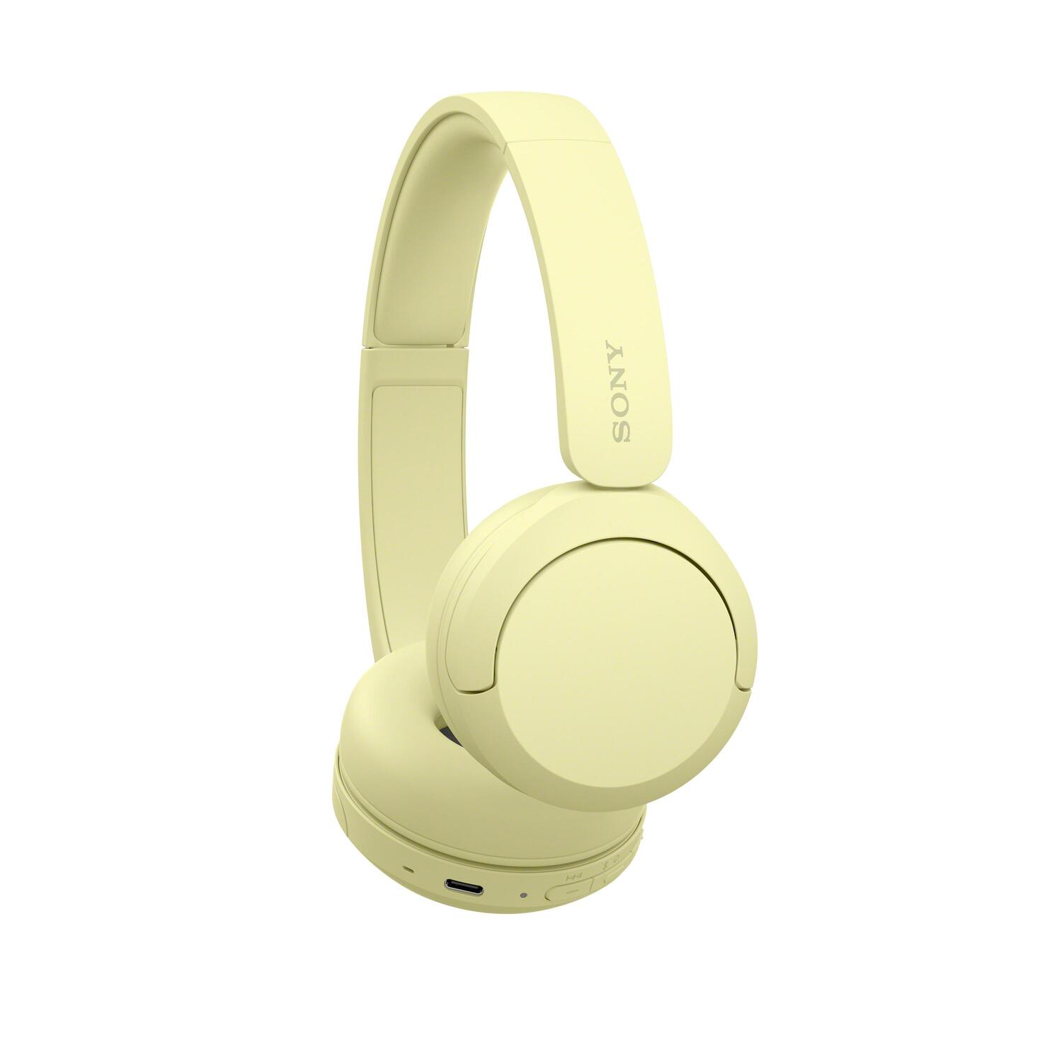 Casque Sony jaune avec serre-tête et écouteurs.